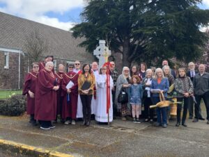 Palm Sunday 2024: Church Photo outside sidewalk in front of Celtic Cross.